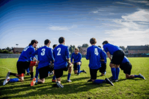 soccer players with blue uniform